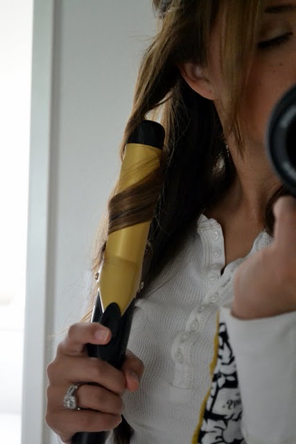 Curling hair with curling iron