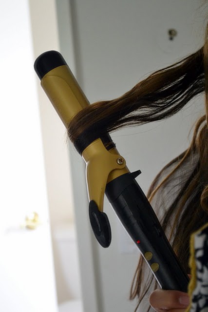 Curling hair with curling iron