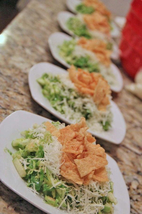 shaved brussel sprout salad with peccorino romano cheese and green apples